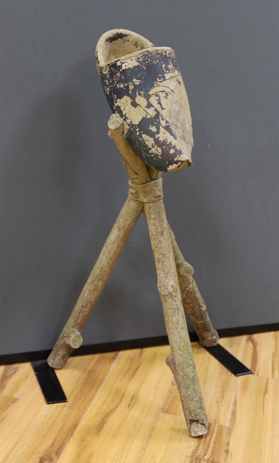 A reconstituted stone 'clog' jardiniere, 83cm